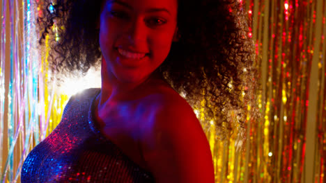 Close-Up-Of-Woman-In-Nightclub-Bar-Or-Disco-Dancing-With-Sparkling-Lights-14